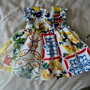 Baby 6 month Dolce & Gabbana dress . Just once . Excellent condition.